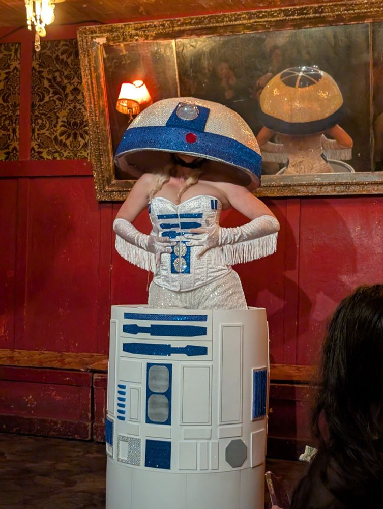 Alice Wonder as R2D2 on stage.