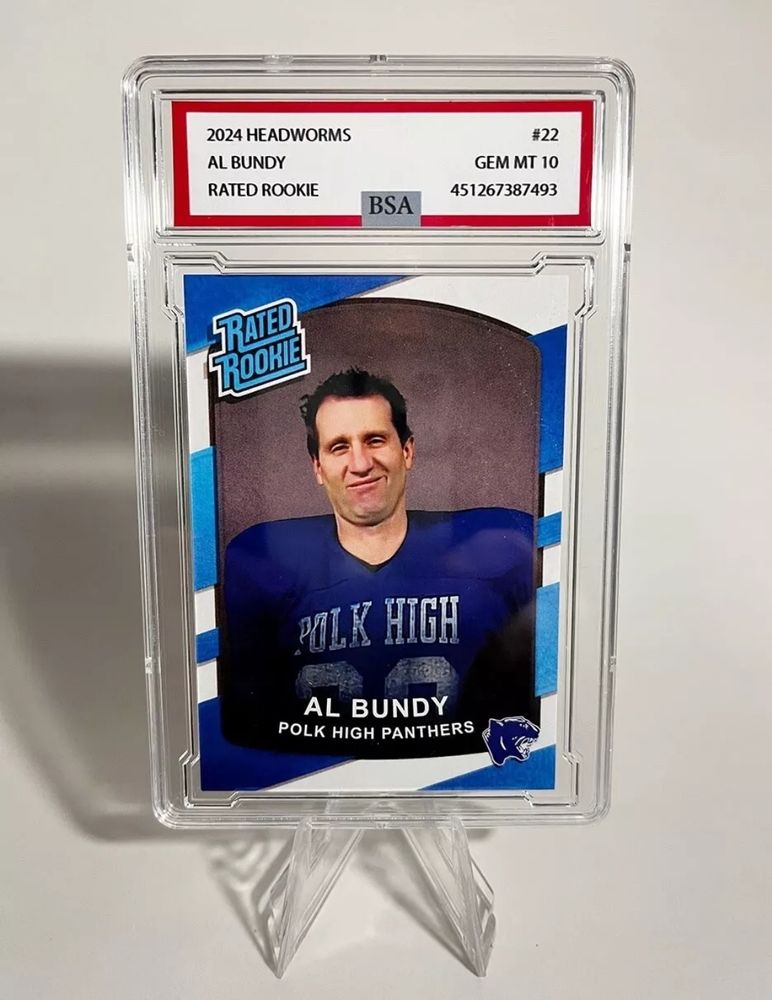 Card slab with custom made Al Bundy football card. 