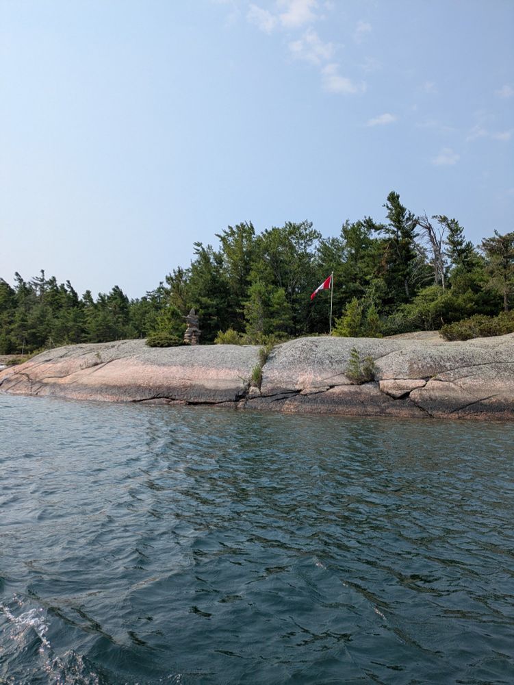Georgian Bay.  Canadian flag and Inukshuk.  2025
