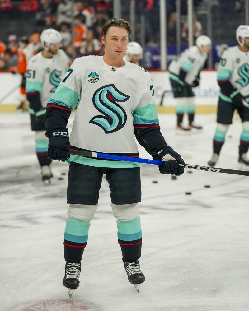 Photo of Berkly standing on ice during warmups.