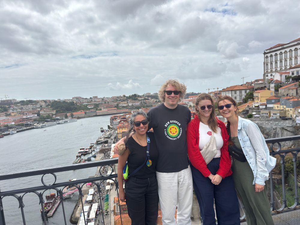 ROTO members Jan, Ann-Christin and Vera together with ROTO fellow Abigail on the bridge with the roofs of Porto in the background.
