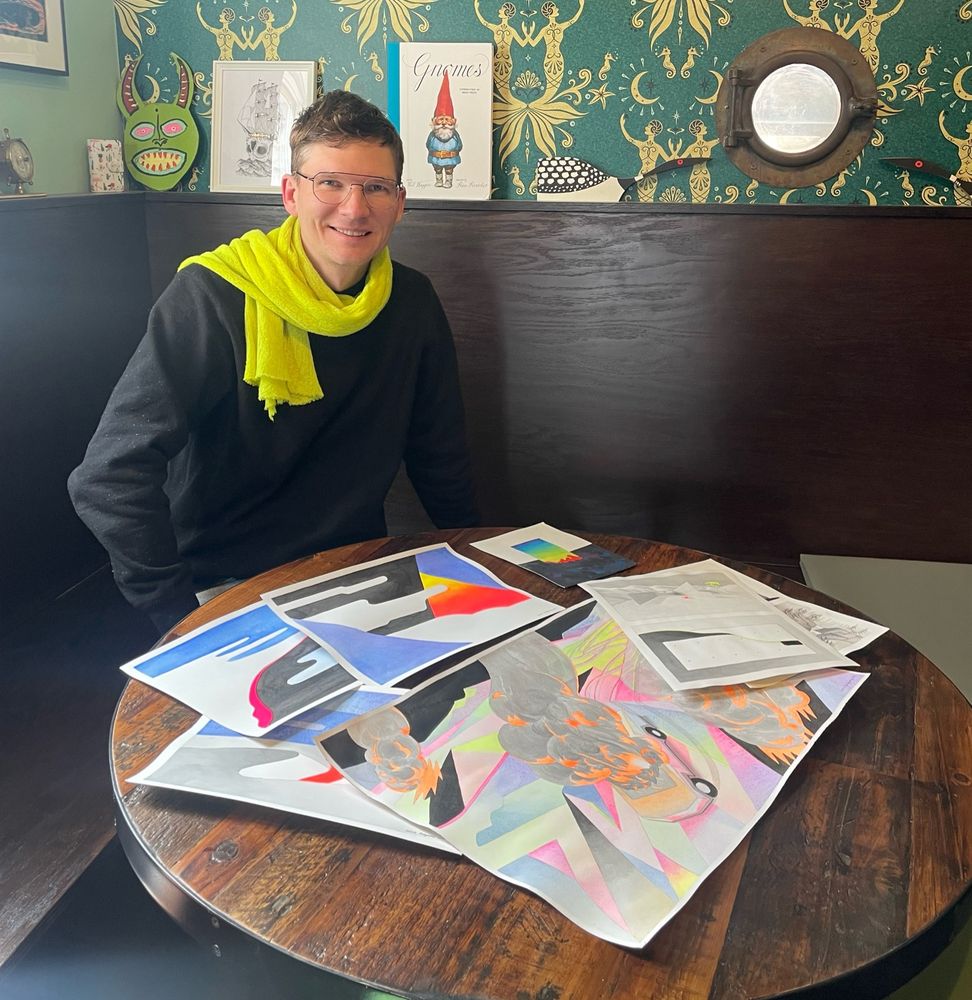 Photo of me sorting through my art at the Ghost Ship gallery in Washburn WI. 