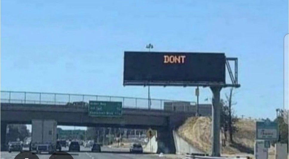 a digital road sign that says "DON'T"