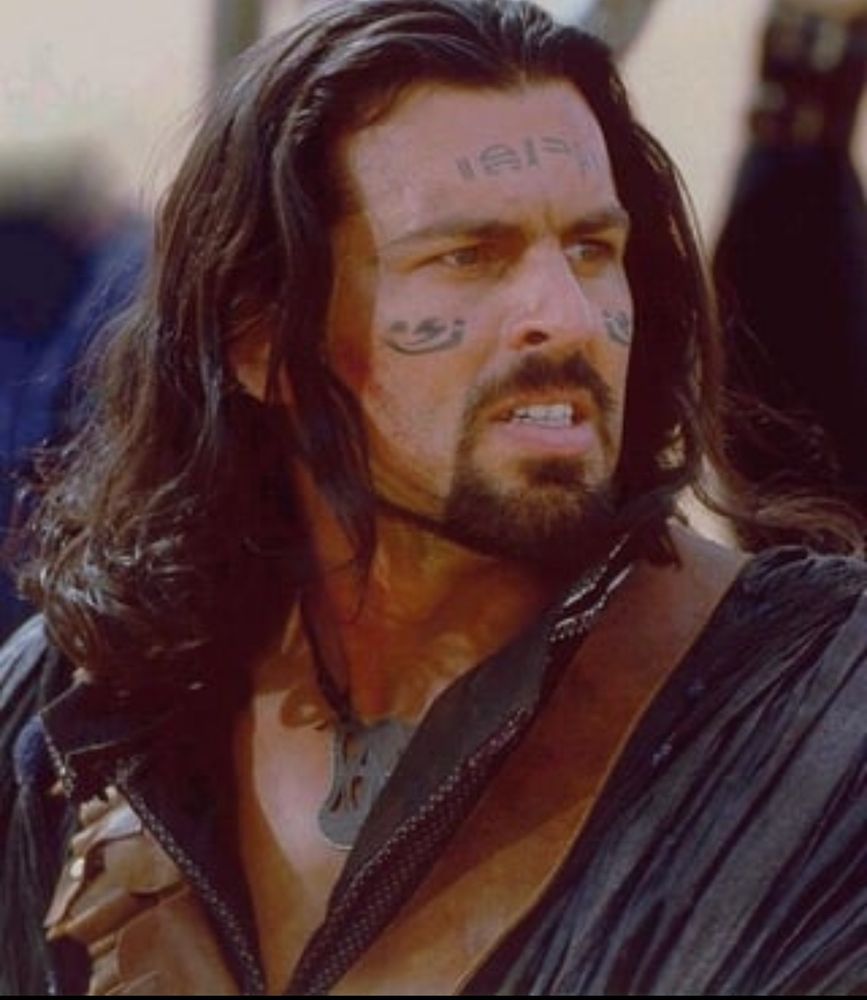 Actor Oded Fehr as a character whose name I can’t remember from one of the movies from The Mummy franchise. He looks remarkably like George Harrison. 