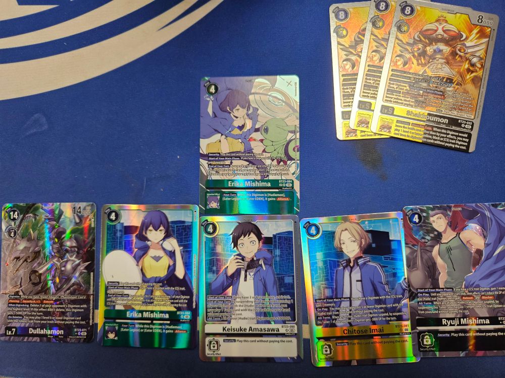 Digimon cards, including an SP Erika Mishima