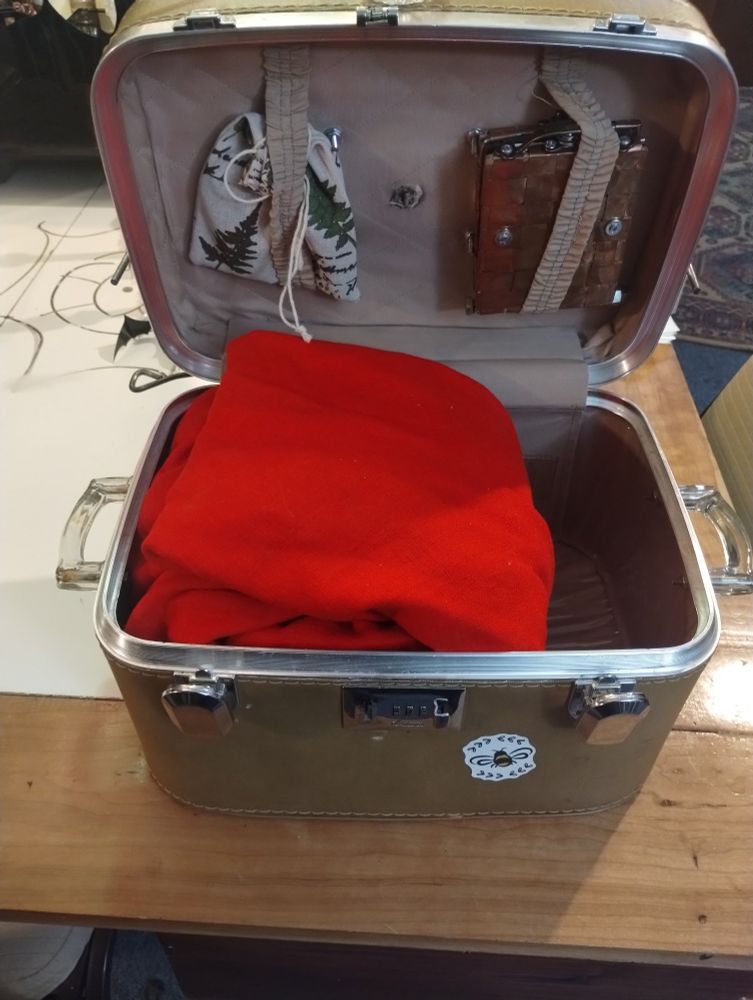 Open Head Unit Assembly case with mounting hardware bag, mark-tally case (copper Faraday model shown), and Head Unit (wrapped in shawl).