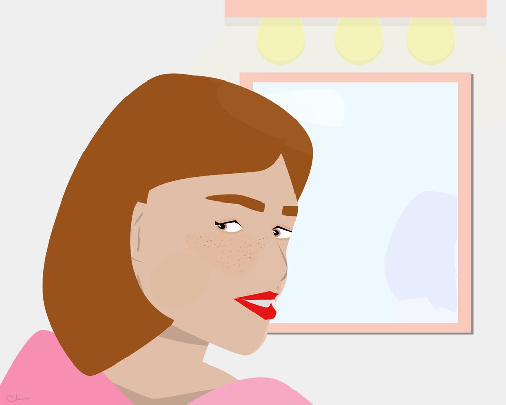 A stylized vector illustration of a woman with straight auburn hair, soft freckles, and red lipstick turning over her shoulder toward the viewer. She wears a pink off-shoulder top and stands in front of a lighted vanity mirror with a pale peach frame. Her reflection appears faintly in the mirror behind her. Warm highlights on her hair and soft shadows on her back suggest bright overhead lights.