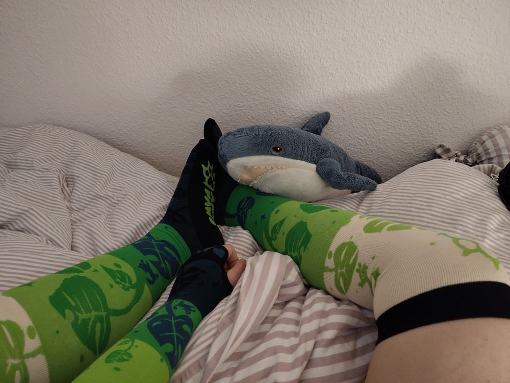 Me wearing the Monsterra socks and armwarmers by Angy Paws