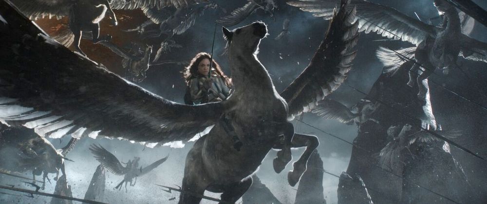 screenshot of Marvel's Valkyrie on Warsong, a flying horse with outstretched wings, riding in to battle.