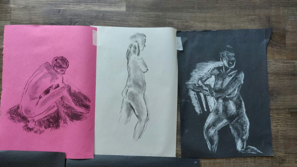 Three drawings of a woman in different poses. Charcoal and chalk