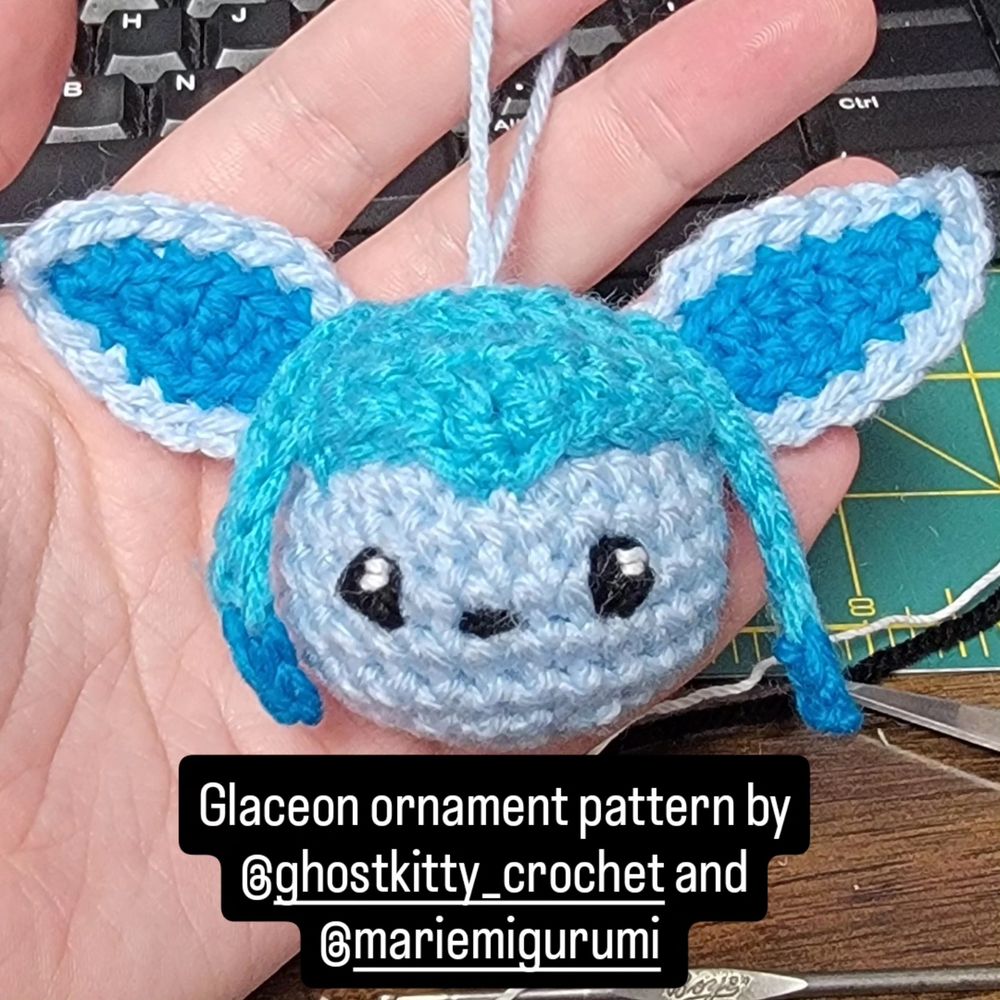 Crochet Pokémon ornament in the shape of a Glaceon head