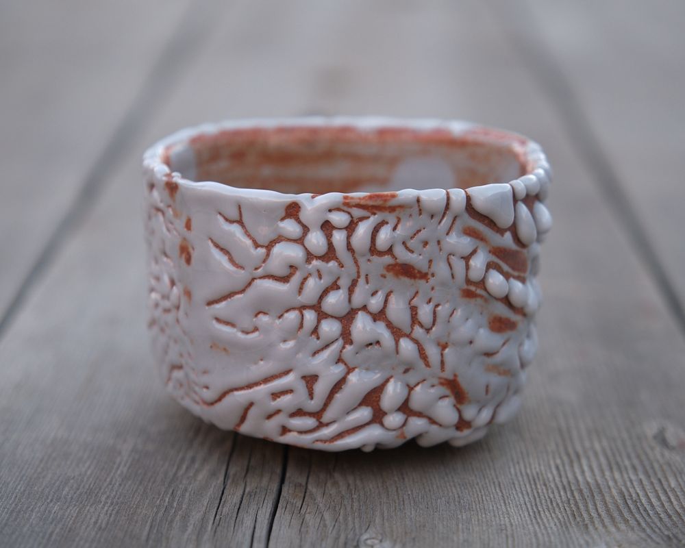 Front of chawan showing crawling and finger swipes.