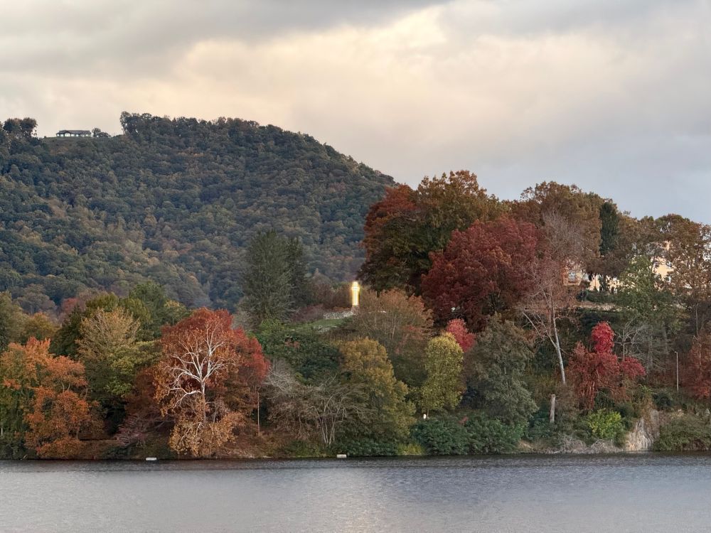 glowing cross on a hill in Lake Junaluska 