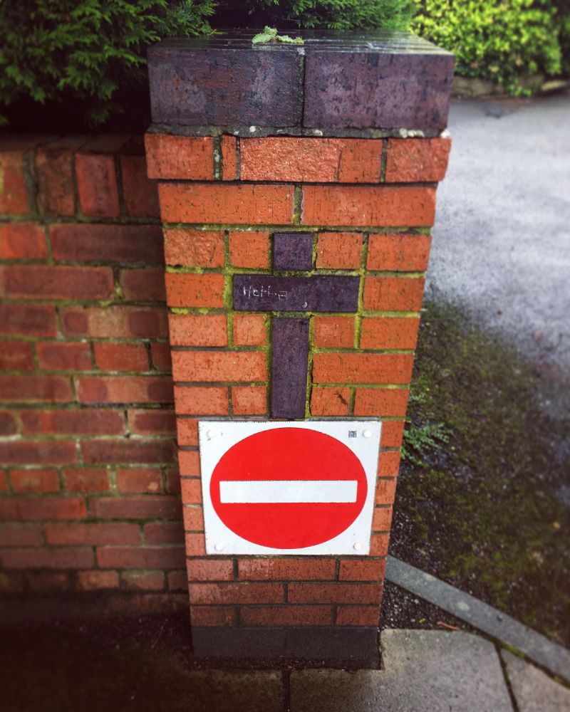 a sign warning about holy hand grenades