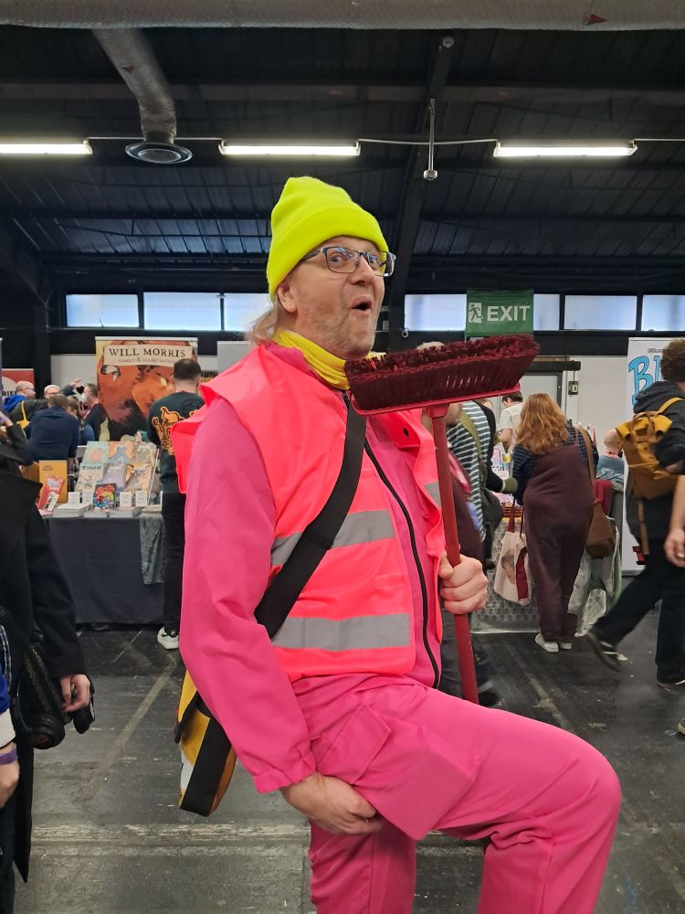 Cosplayer dressed as the man from the Pepto Bismol advert who sings "Diarrohea!" - best cosplayer ever! He said I was the first person to recognise him, and he gave me a sticker.