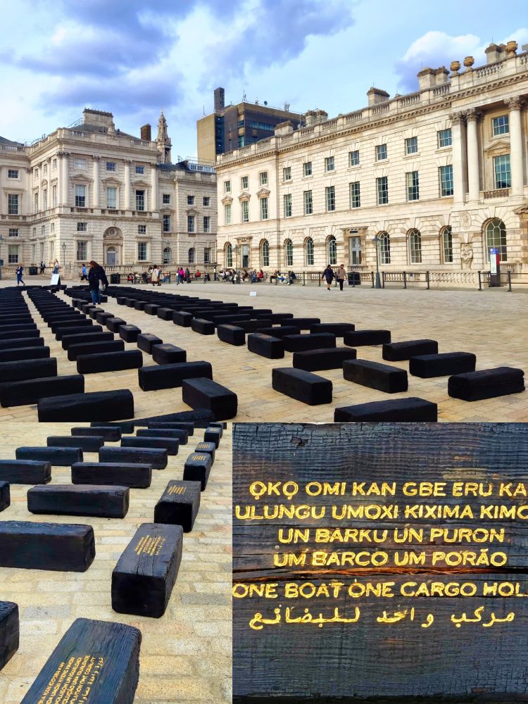 charred wood. emossed in gold. in Somerset house. 
the outline of a slave ship.