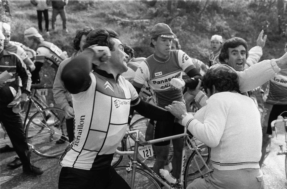 Bernard Hinoult trying to punch a protestor during the 1984 Paris Nice race because they were blocking the race. 