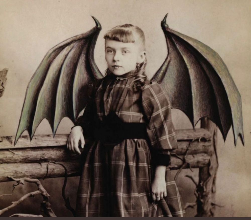 Goth girl with bat wings