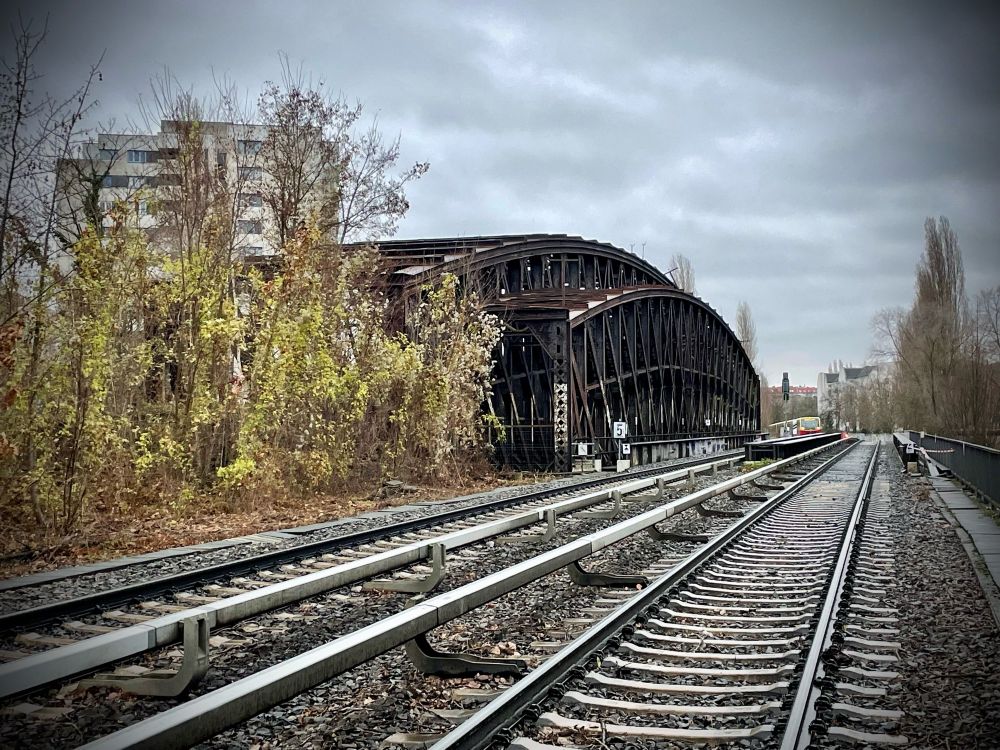 The abandoned Liesenbrücken bridges with railway tracks beside them, teasing them, for they used to carry trains themselves in the good old days. 