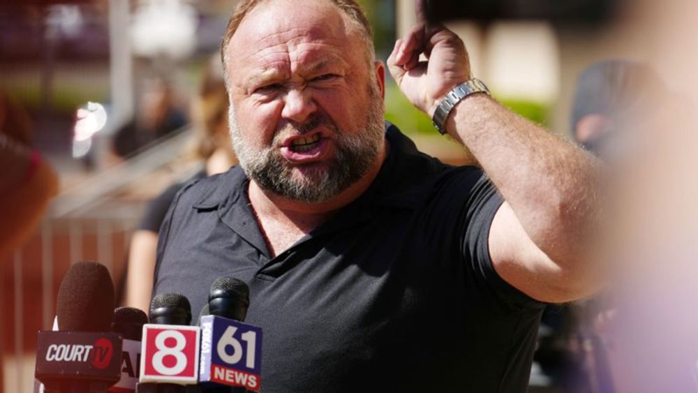 Alex Jones’ conspiracy theory empire Infowars will be sold for parts to help pay Sandy Hook families | CNN Business