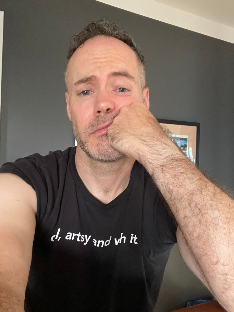 Me, resting my face on my fist, looking utterly befuddled