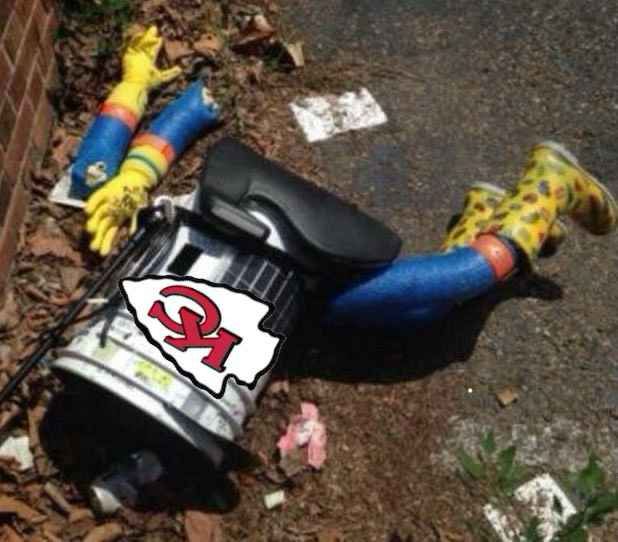 Photo of the “Hitchhiker Robot” broken and in the ditch (which happened in Philadelphia) with the Kansas City Chiefs logo overlaid the broken body.