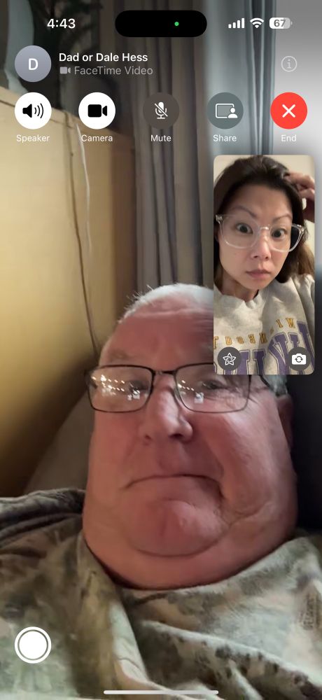 Screen shot of a FaceTime call between Tory and her dad both looking stunned. 