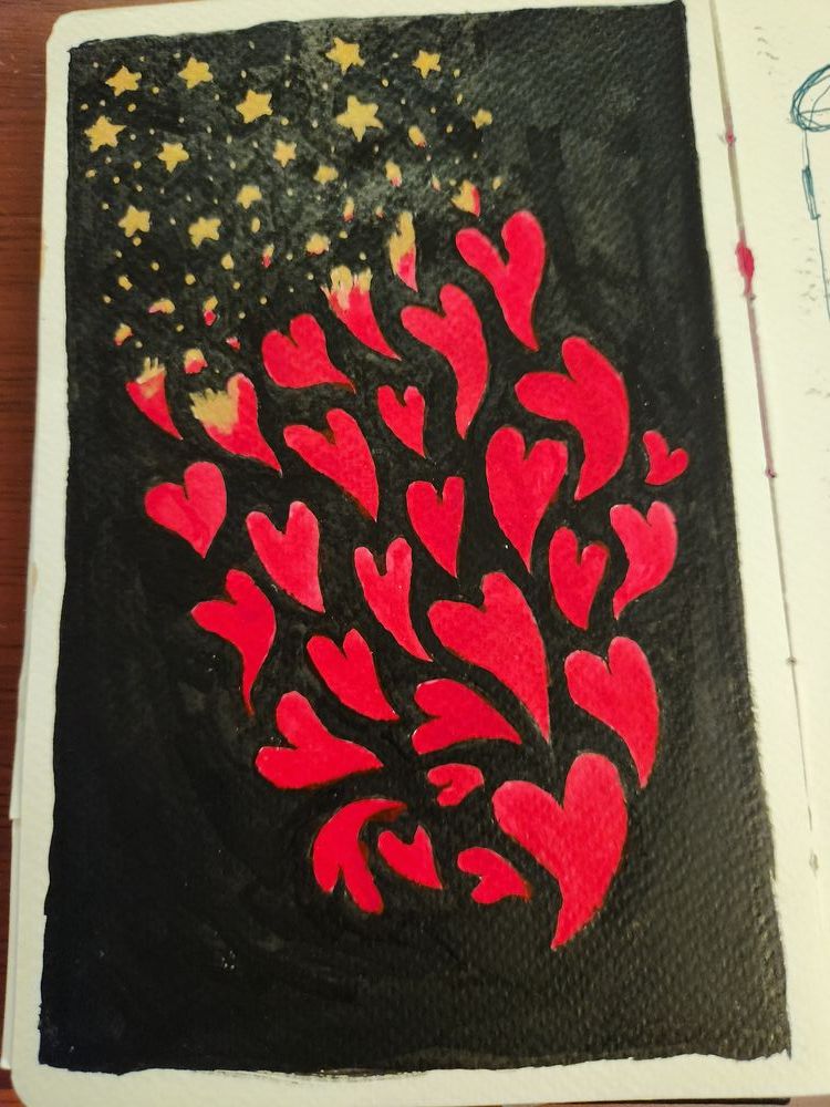 black background, red hearts coming up from the lower right corner and they turn into golden stars towards the top left corner