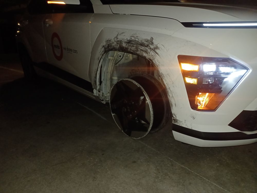 Passenger-side front wheel - gone.