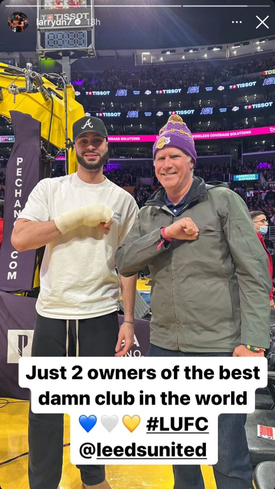Larry Nance Jr and Will Ferrell pose doing the Leeds salute.