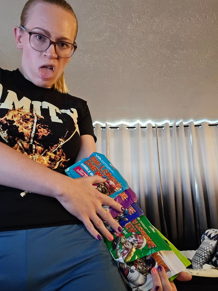 bambs with a spread of different big league chew flavors across faer arm