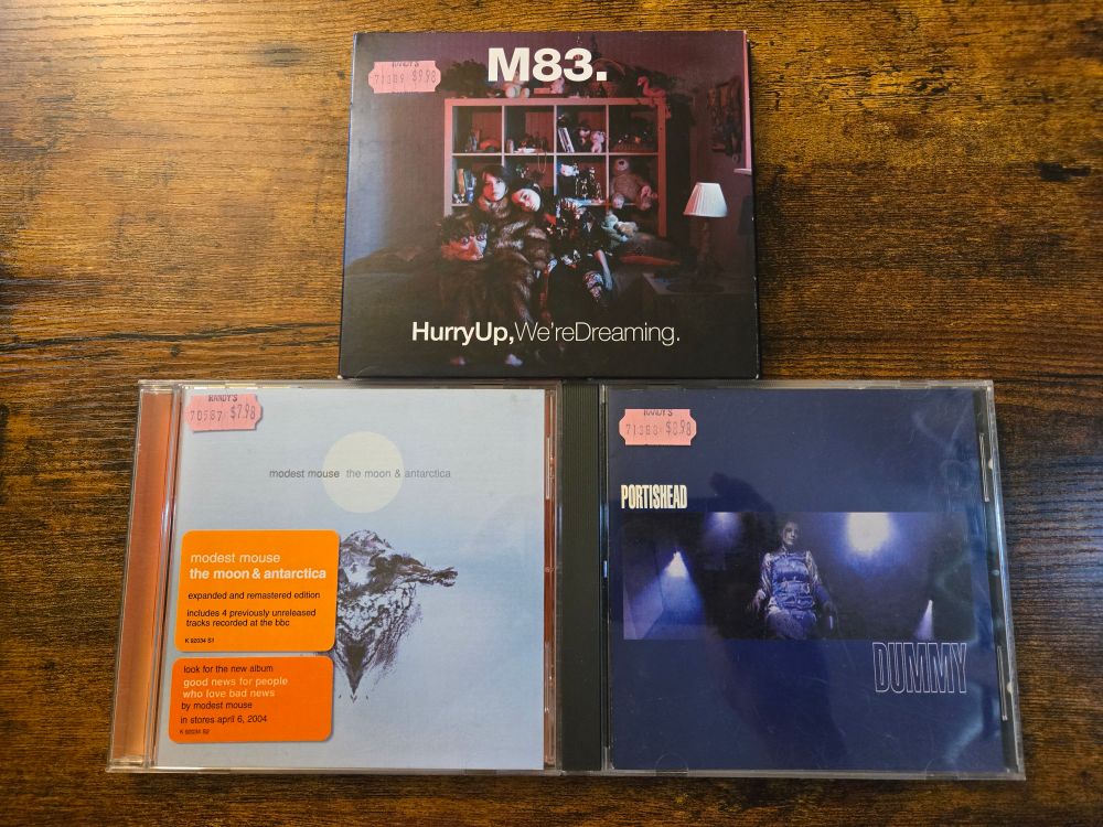cd's of m83. - hurry up, we're dreaming. modest mouse - the moon & antarctica. portishead - dummy.