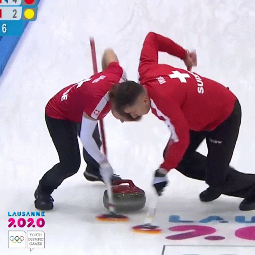 a curling game is being played in lausanne during the olympics