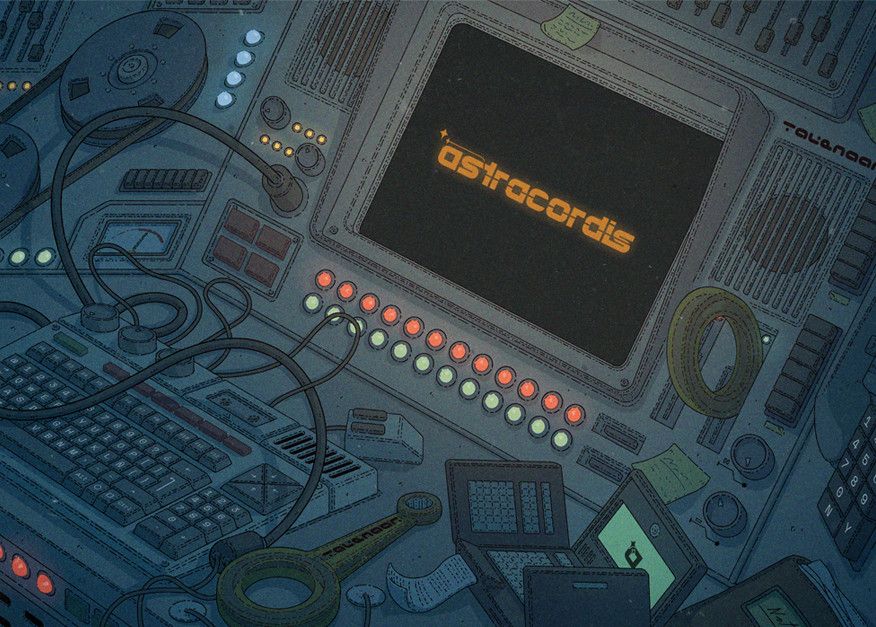 Terrminal de acceso a Astracordis: un monitor gris lleno de botones y ranuras, un teclado, cintas de acceso y un pequeño terminal portátil sobre la mesa.