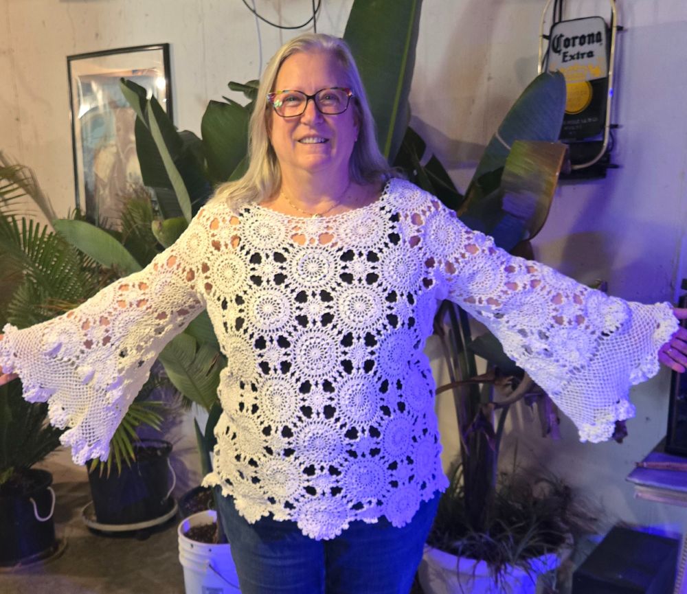 Crocheted lace bell bottom sleeve blouse