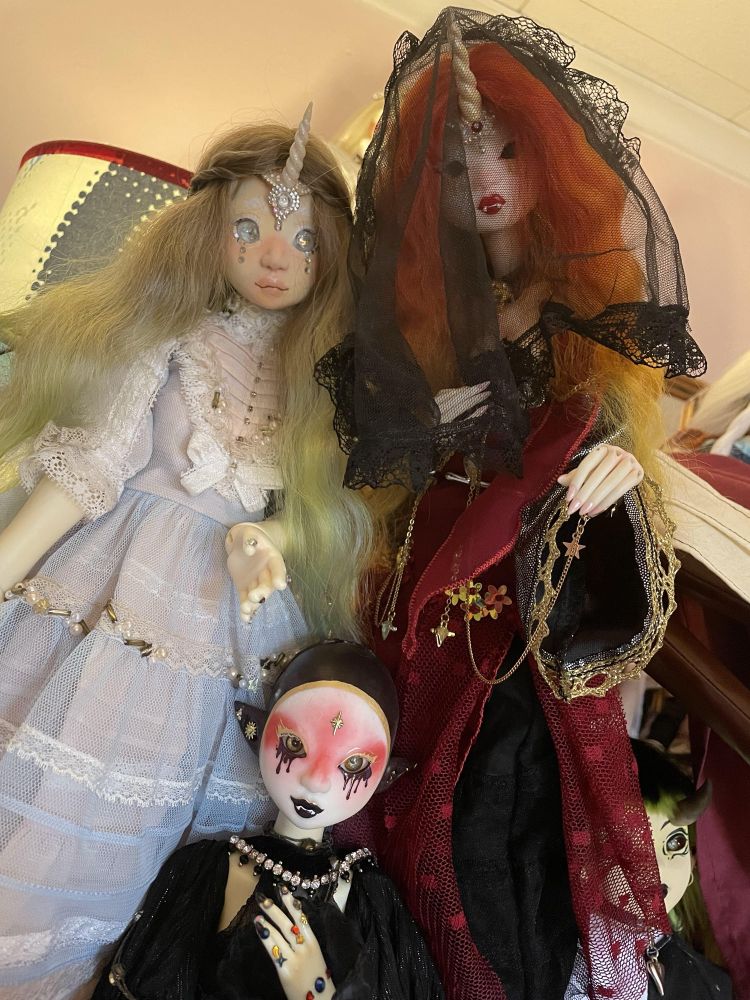 3 ball jointed dolls, two count sheepy and one normal sheepy. They are by Sleepy Sheepy Dolls. One count had a unicorn hair with red hair. The sheepy has brown green hair with a unicorn horn. 
