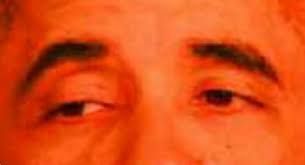 a red tinted picture of Obama's eyes, usually associated with the words "then perish"