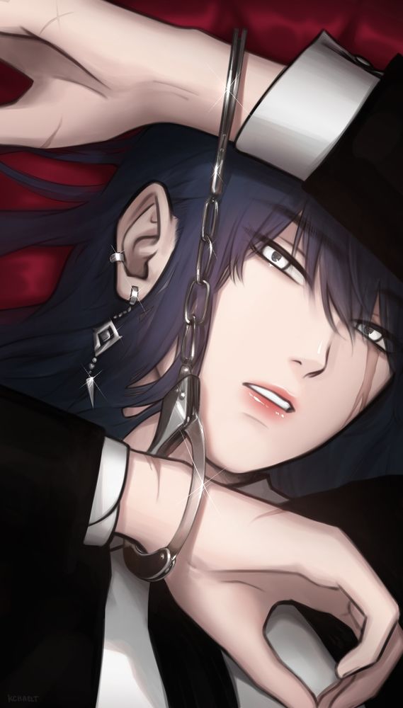 Close up shot of Rahu (Path to Nowhere) lying on a red sheets with her hands cuffed above her face.