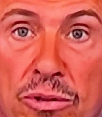 Zoom in of Cuomo's face