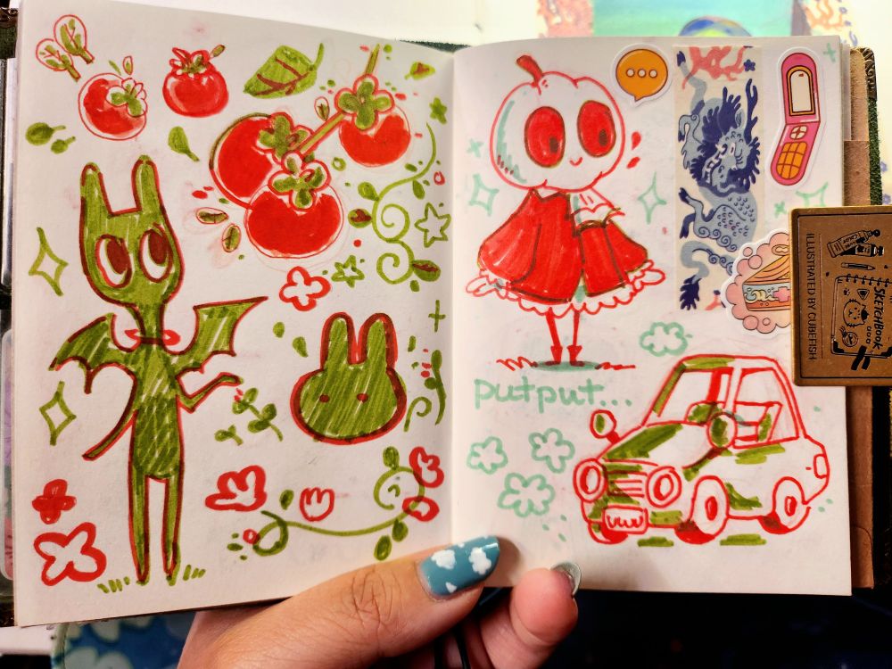 Various sketches made with red and green markers of demons and cars 