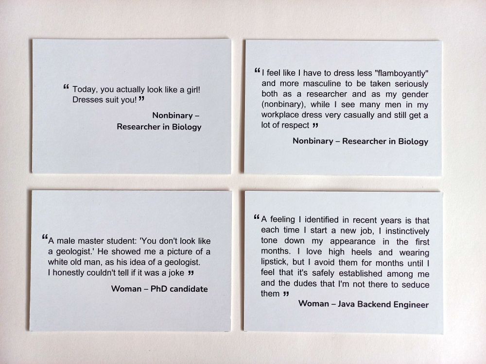 Quotes from the exhibition printed on small papers and laid out on a off-white surface