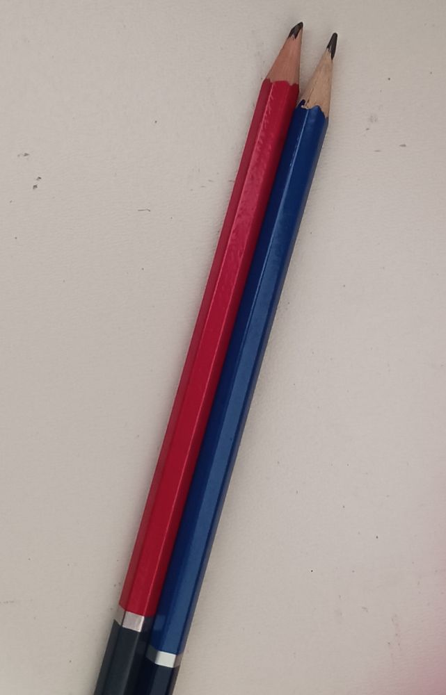 A red pencil and a blue pencil 