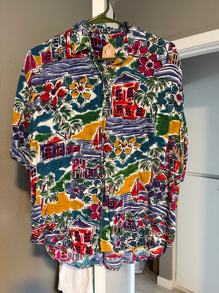 A very loudly printed drapey resort shirt