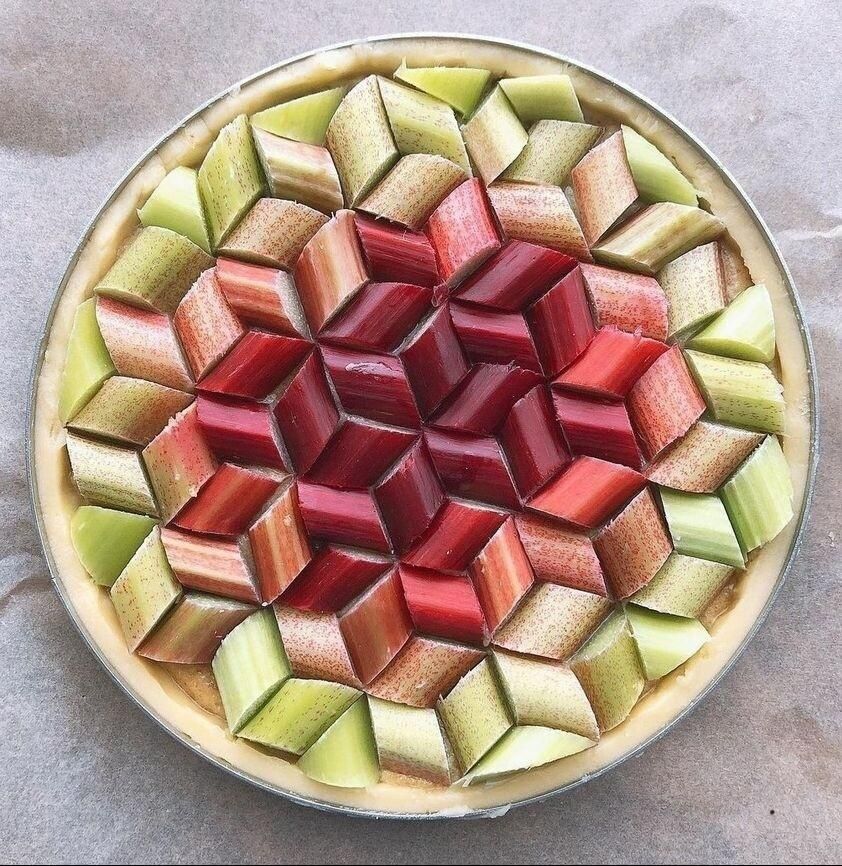 a rhubarb pie with meticulously tiled rhubarb pieces