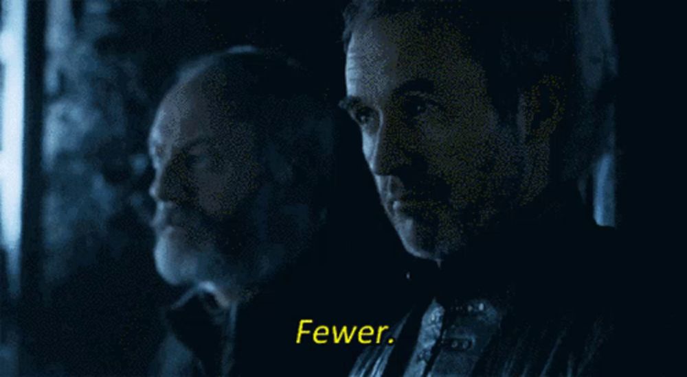 a man in a dark room says fewer