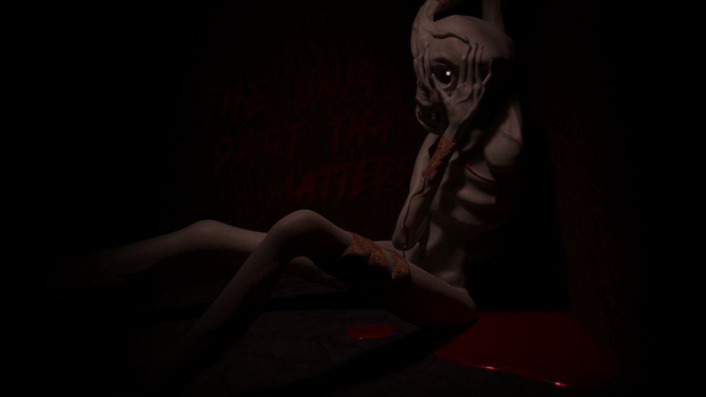 An emaciated naked being sits in the corner of a dimly lit room, dripping with blood.
The wall next to it reads "The only part that matters"