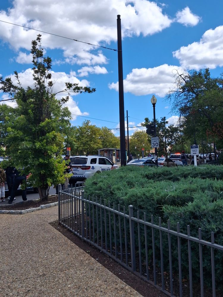 ICE officers stopping people outside the Pentacle