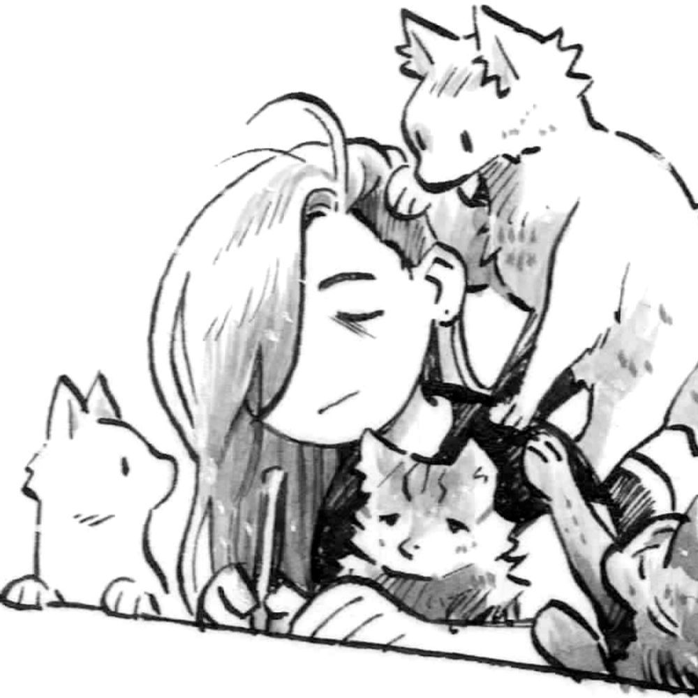 A greyscale ink of me working surrounded by kitties