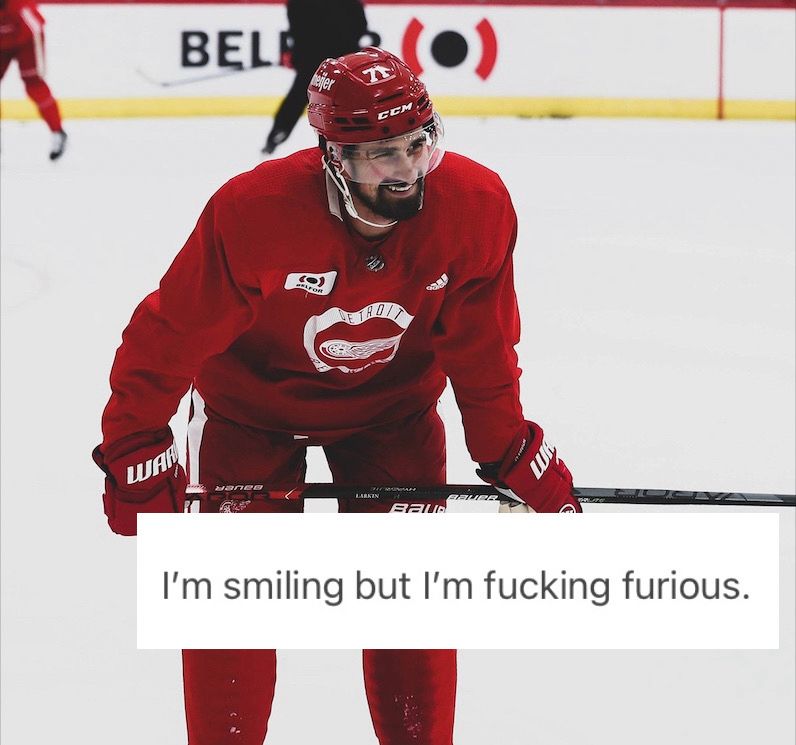 Dylan Larkin smiling captioned I’m smiling but I’m fucking furious 