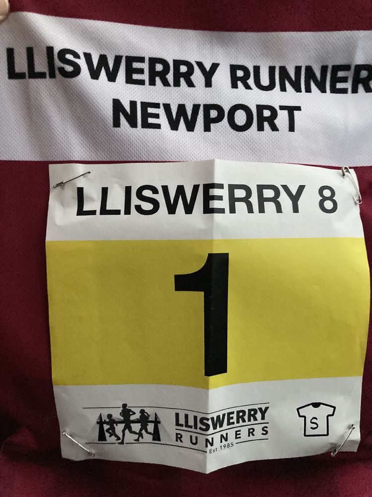 Race bib number 1 for the Lliswerry 8 race, pinned into a running vest